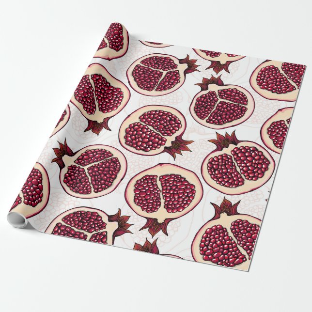 Pomegranate slices on white wrapping paper (Unrolled)