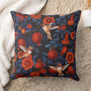Pomegranates and hummingbirds/blue leaves on black cushion
