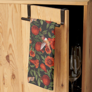 Pomegranates and hummingbirds/green leaves on blac tea towel