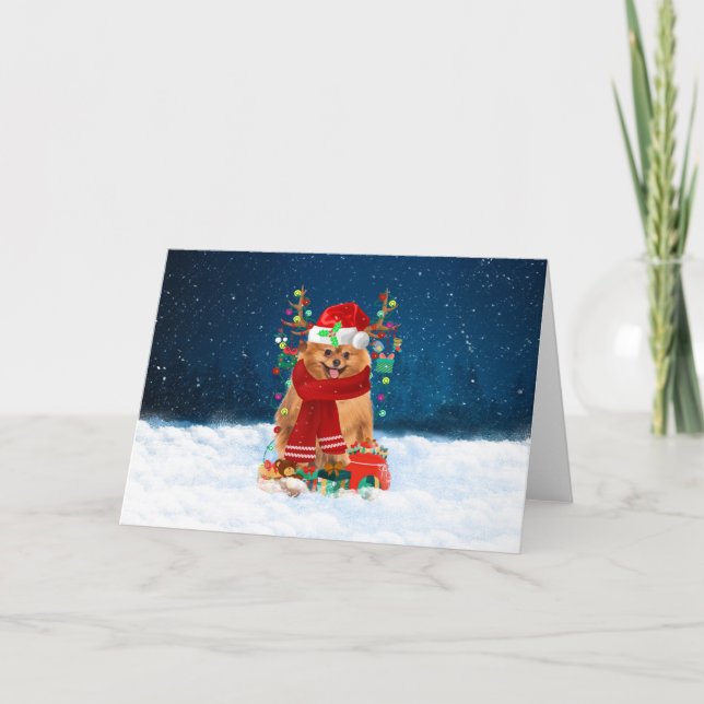 Pomeranian Dog in Snow with Christmas Gifts Card (Front)