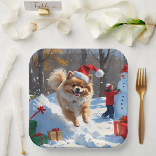 Pomeranian Running in Snow with Christmas Hat Paper Plate