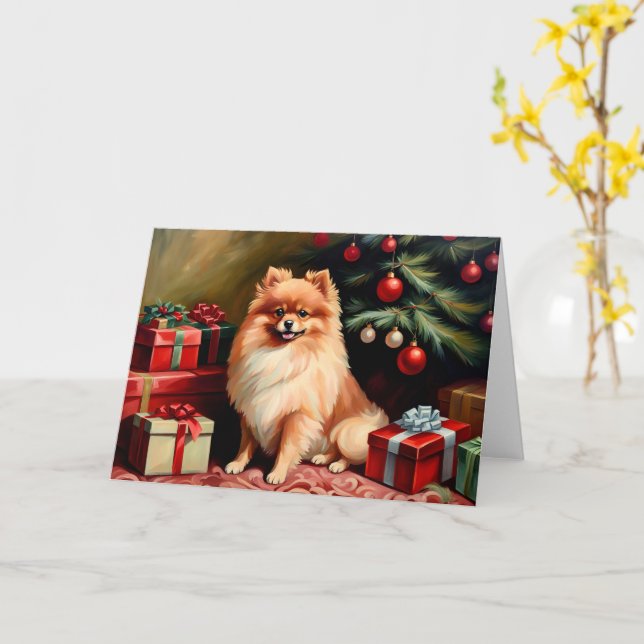 Pomeranian sitting by Christmas tree Card (Yellow Flower)