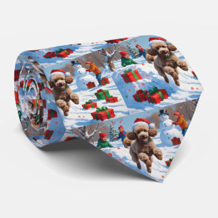 Poodle Running in Snow with Christmas Hat Tie
