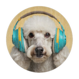 Poodle wearing headphones cutting board