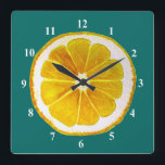 Pop art yellow lemon fruit original watercolour square wall clock<br><div class="desc">A cute and colourful vibrant yellow lemon fruit slice from an original painting by artist Sacha Grossel. This large pop art style fruit is yellow and very bright and colourful against a customisable blue teal coloured background. Quirky and original.</div>