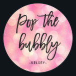 Pop the Bubbly | Pink Bokeh Look Bridal Shower Classic Round Sticker<br><div class="desc">These modern and stylish bridal shower stickers feature a pink bokeh look background,  with trendy black typography that says "pop the bubbly."</div>