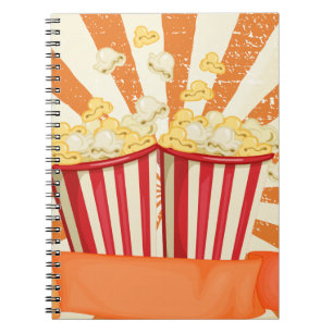 Popcorn in cups with banner notebook