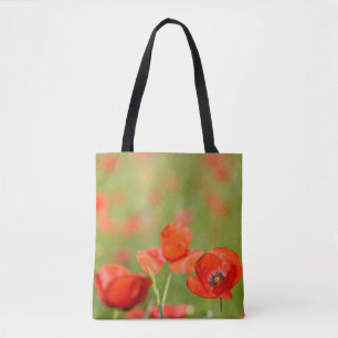 Poppies in a poppy field tote bag