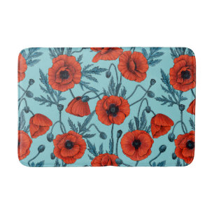 Poppies, red and blue on pool blue bath mat