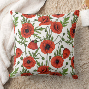 Poppies, red and green on white cushion
