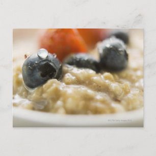 Porridge with berries, close-up postcard