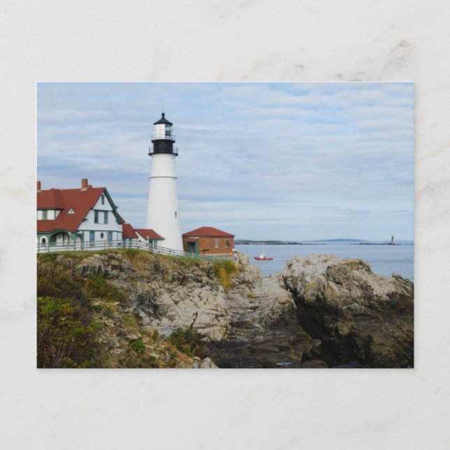 Portland Headlight lighthouse on rocky shore Postcard (Front)