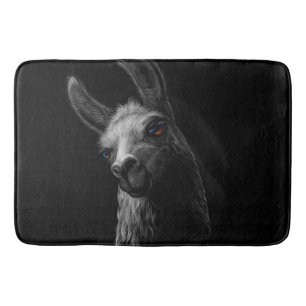 Portrait Head Cute Llama with a Black Background Bath Mat