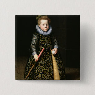 Portrait of a four-year old boy with club and 15 cm square badge