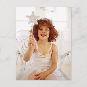 portrait of a young girl dressed an angel postcard