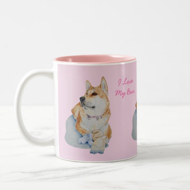 portrait of cute akita cuddling teddy bear Two-Tone coffee mug (Left)
