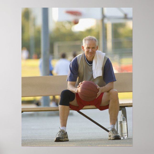 Portrait of mature man with basketball sitting poster (Front)