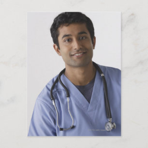 Portrait of young male nurse, studio shot postcard
