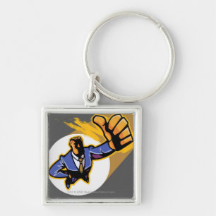 Portrait of young man showing thumbs up key ring