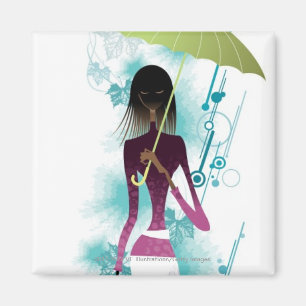 Portrait of young woman holding purse and umbrella magnet