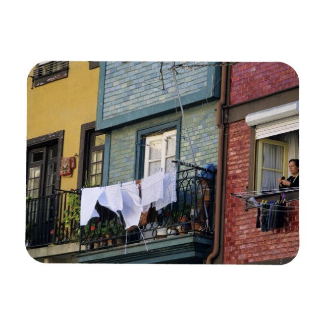 Portugal, Oporto (Porto). Woman hanging laundry Magnet (Horizontal)