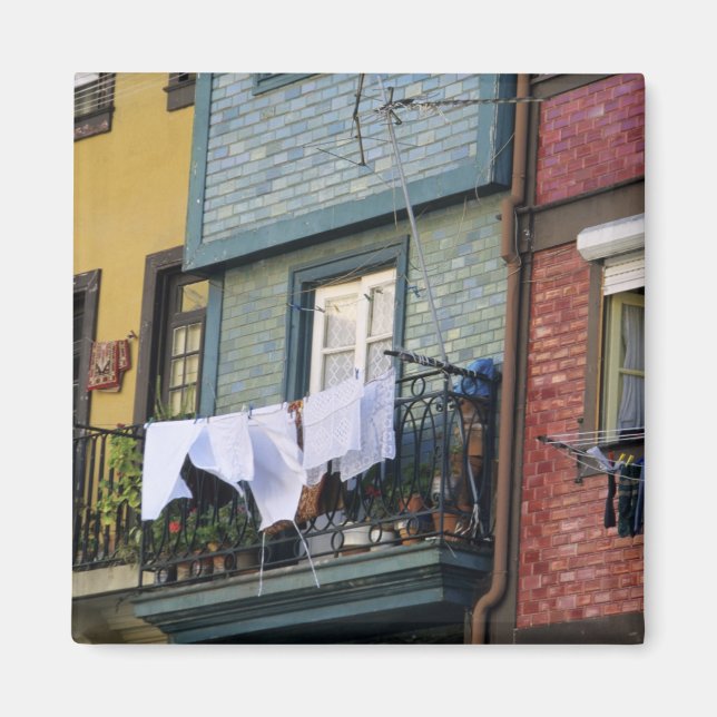 Portugal, Oporto (Porto). Woman hanging laundry Magnet (Front)