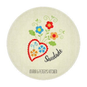 Portuguese folk heart with saudade word cutting board