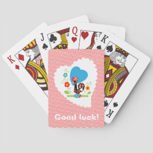 Portuguese rooster with red polka dots playing cards