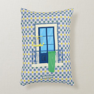 Portuguese tiles and window balcony with bird decorative cushion