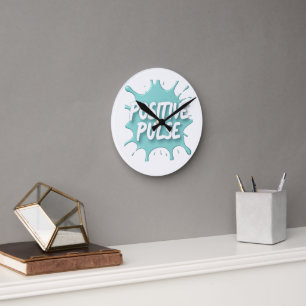 Positive Pulse Splatter Graphic Round Clock