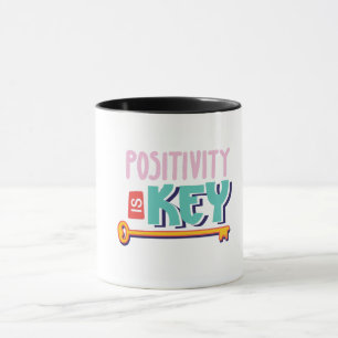 positivity is the key design mug