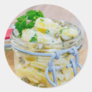 Potato salad in a jar on wooden classic round sticker