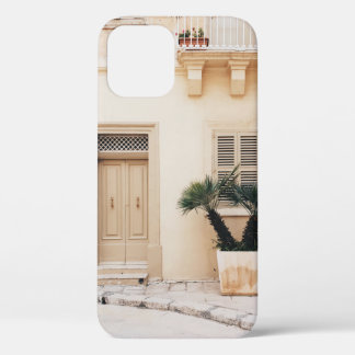 Potter plant near concrete house iPhone 12 case
