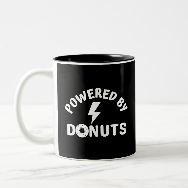 powered by donuts Two-Tone coffee mug (Left)