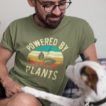 Powered by Plants Vegan Vegetarian Retro  T-Shirt<br><div class="desc">This design was created though digital art. You may change the style of this shirt by choosing More > under the style option. It may be personalised in the area provide or customising by choosing the click to customise further option and changing the name, initials or words. You may also...</div>