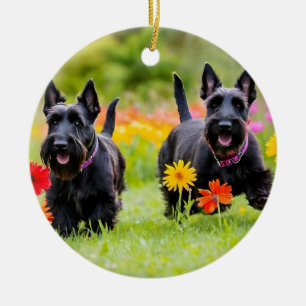 Prancing Scottish Terriers in grass and flowers Ceramic Tree Decoration