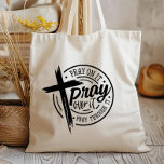 Pray On It Christian Cross Bible Verse Tote Bag<br><div class="desc">Introducing our "Pray On It, Pray Over It, Pray Through It" Tote Bag – a meaningful and stylish accessory that combines faith with practicality. The design features a cross, symbolising devotion and strength. This tote bag is a powerful expression of faith, embodying resilience and hope. Its elegant graphic adds a...</div>