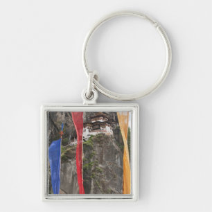 Prayer flags hang near Taktshang Key Ring