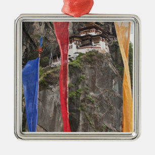 Prayer flags hang near Taktshang Metal Tree Decoration