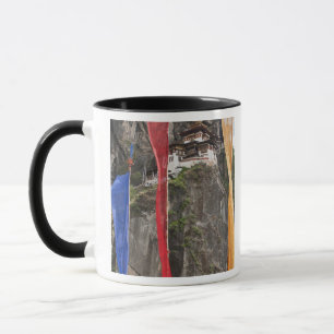 Prayer flags hang near Taktshang Mug