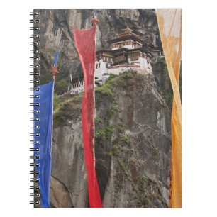 Prayer flags hang near Taktshang Notebook