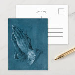 Praying Hands | Albrecht Dürer Postcard<br><div class="desc">Praying Hands (1508), also known as Study of the Hands of an Apostle, is a pen-and-ink drawing by German artist Albrecht Dürer. The original artwork was created using the technique of white heightening and black ink on blue coloured paper. The drawing shows a close up of two male hands clasped...</div>