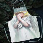 Praying Little Girl Angel Believe Typography Apron<br><div class="desc">Sweet,  little girl,  blonde angel with folded hands praying.  She's dressed in a white gown,  has white wings,  and a yellow halo.  Believe typography at top is also a template for any text or to personalise with a name.</div>