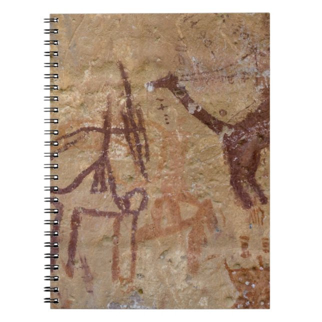 Prehistoric rock paintings with camels and notebook (Front)