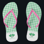Preppy Green and Pink Wedding Pickleball Flip Flops<br><div class="desc">Whether you're chilling out after hitting the pickleball court or chilling out before your big day, these personalised flip-flops are the perfect footwear. They feature a green and white gingham pattern as well as illustrations of green and white heart-shaped pickleball paddles and a pink pickleball. These are ready to be...</div>