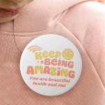 Preppy keep being amazing slogan smilie face 7.5 cm round badge<br><div class="desc">Preppy style child's confidence a booster pin button badge. Reads Keep Being Amazing with a smiling face with starry eyes and rainbow stripes in pastel yellow, coral, pink design. Personalise with your own extra choice of wording, currently reads, you are beautiful inside and out. Original graphic art and design by...</div>