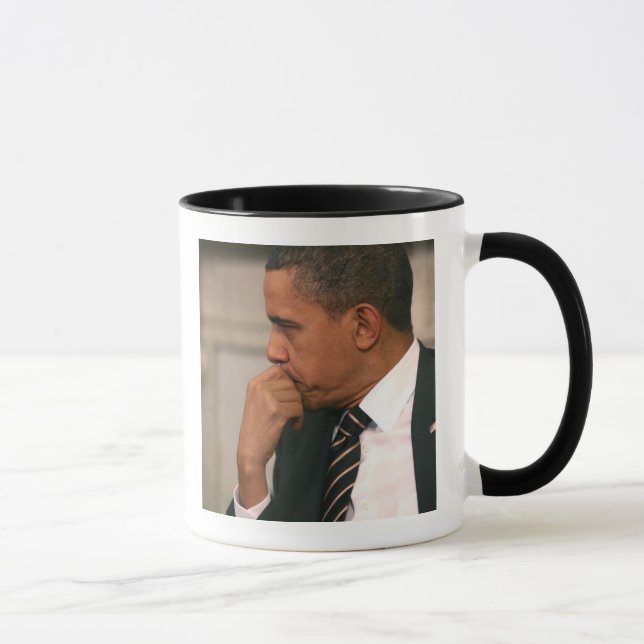 President Barack Obama meets with President Mug (Right)