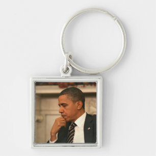President Barack Obama reflects as he meets Key Ring