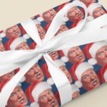 President Donald Trump Fun Kitsch Christmas Wrapping Paper Sheet<br><div class="desc">Festive image of President Trump wearing a Santa Hat! Wrap your holiday gifts with the face of the 45th President of the USA, President Donald Trump. Colourful and fun photo and full-colour sheets of gift wrap for Christmas! President Trump wearing a Santa hat is perfect for patriotic Republicans and Trump...</div>