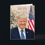 President Donald Trump Merry Christmas Photo Holiday Card<br><div class="desc">Classy sophisticated and elegant President Donald Trump Christmas card with the phrase "Merry Christmas" and an elegant gold and white Christmas tree as seen in the White house along with an American Flag in the background! Patriotic holiday Christmas card with the USA president.</div>